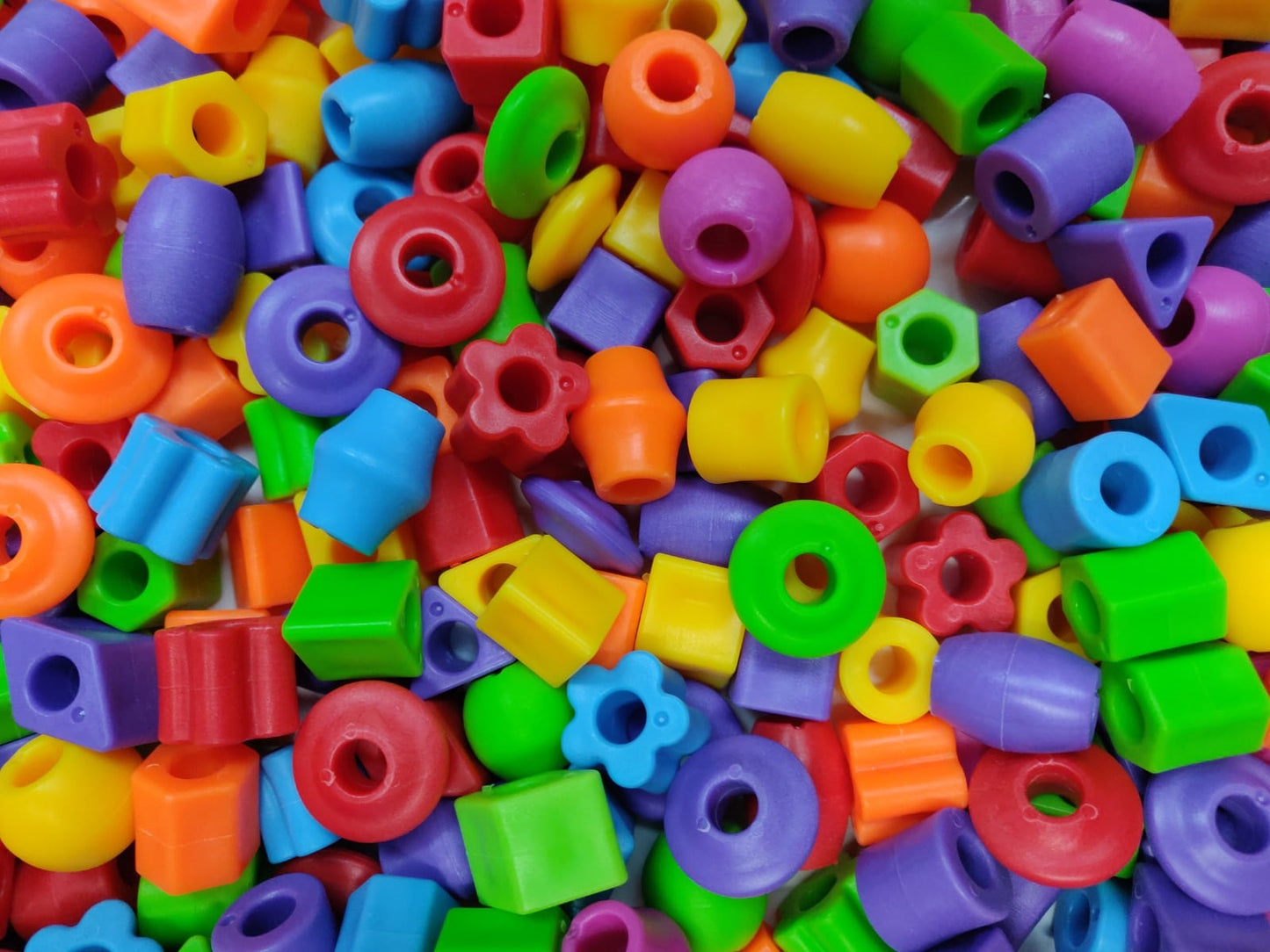 120 pcs Assorted Plastic Lacing Beads in a Bucket