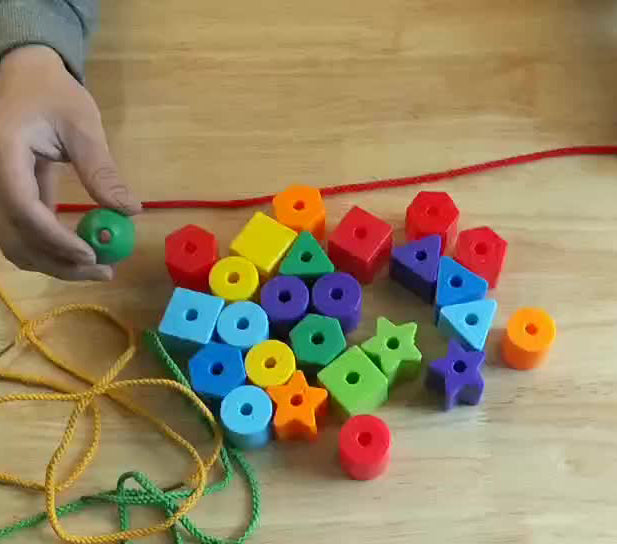 Plastic Jumbo Beads in a Bucket