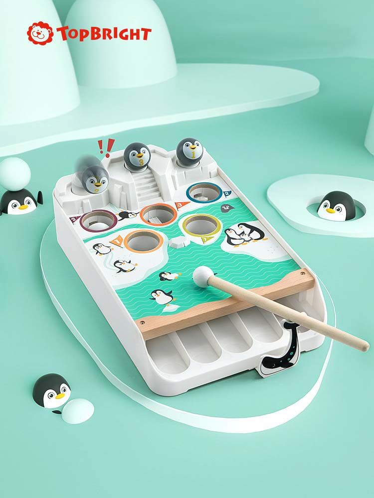 Top Bright - Penguin playing snowball table game