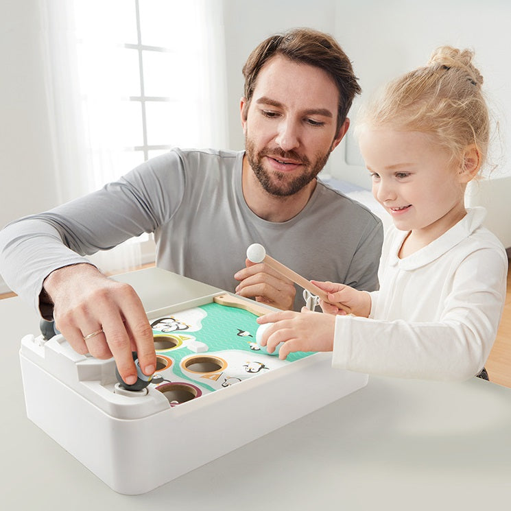 Top Bright - Penguin playing snowball table game
